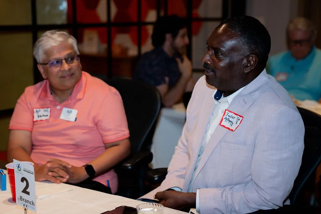 Two participants talking during a networking breakout session
