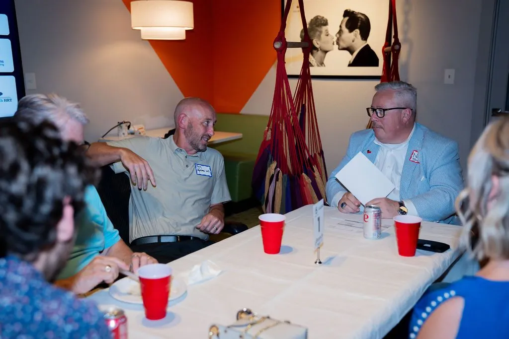 Professionals networking over conversation at a brunch